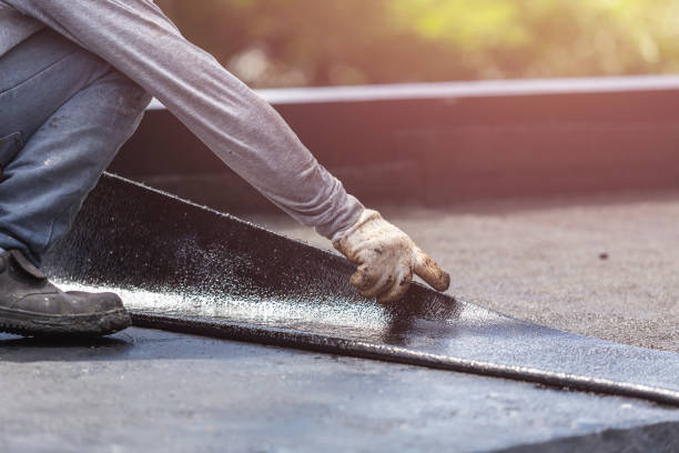 Professional Emergency Waterproofing technician working in Harrisburg, OH